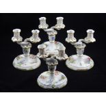 A set of four Herend porcelain Queen Victoria pattern two branch candlesticks with detachable