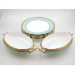A Victorian Minton style thirty piece part dinner service decorated with pale green gilded borders.