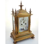 A late Victorian aesthetic movement ormolu mantel clock with eight day movement striking on a