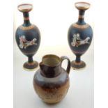 A group of Victorian and later ceramics to include a pair of Etruscan revival vases, a Doulton