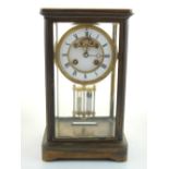 An early 20th century French four glass mantel clock, barrel movement, strikes a bell on half