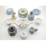 A Meissen porcelain two handled sauce boat, a later pin jar and cover, two floral Meissen tea