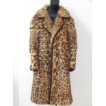 A ladies vintage leopard skin 3/4 length jacket, with silk lining.