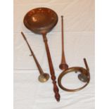 A 20th copper bedwarmer, together with a three brass and copper hunting horns.
