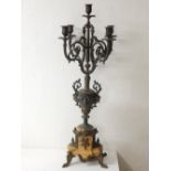 An early 20th century spelter five branch candelabrum, with vase column on shaped marble base. H.