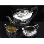 A George V silver plated three piece tea service, stop fluted, (3).