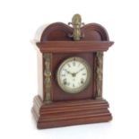 An early 20th century American Ansonia eight day mantel clock, gilt metal mounted mahogany cased.