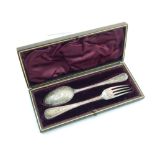 A Victorian silver christening fork and spoon, Josiah Williams & Co London 1889, with beaded, floral