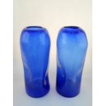 In the style of Biot, a pair of blue hand-blown bubble vases, with ground pontil to bases. H. 35cm