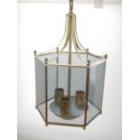 A hexagonal glazed brass hall lantern, a glass ceiling shade, a two branch brass wall light together