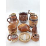 A Victorian salt glazed pottery skillet and cup together a collection of assorted Victorian glazed