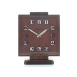 A 1930s Art Deco rosewood Jaeger LeCoultre mantel clock, the rectangular glass dial with Arabic