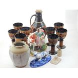 A Victorian Staffordshire pottery group, milkmaid with cow, together with a studio pottery vase, a