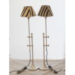 A pair of chrome adjustable table lamps, with faux zebra-skin shades, 84cm, (2).