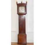 A 19th century mahogany thirty hour longcase clock, the floral painted dial with Roman numerals, the