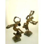 E. Piron, a pair of French Art Nouveau gilt bronze figures of dancing female nudes with billowing