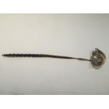 A George III silver punch ladle with coin inset bowl and twist whalebone handle