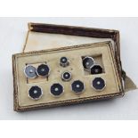 An early 20th century silver cufflink and stud set, boxed.