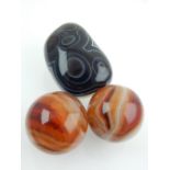 Two polished hardstone balls,