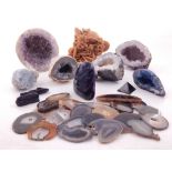 A collection of specimen rocks and minerals to include amethyst geodes, quartz, agate sections etc.