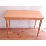 A contemporary satin birch occasional table by David Oldfield,