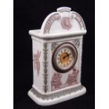 An early 20th century Wedgwood three colour Jasperware mantel clock,