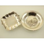 Two silver trinket dishes.
