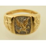 A 9ct yellow gold signet ring, with bird to centre.