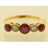 An 18ct yellow gold rubover diamond and ruby set ring.