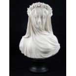 A composition parian effect bust of The Veiled Lady. H.