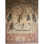 A Persian floral and figural carpet, signed.