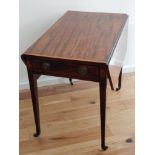 A George III mahogany Pembroke table, the rectangular top with canted corners and peripheral drawer,