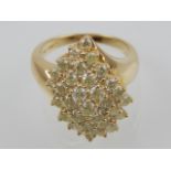 An 18ct yellow gold and diamond dress ring, of naturalistic design.