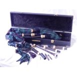 A set of bagpipes, turned wood chanter with ivory and white metal mounts,