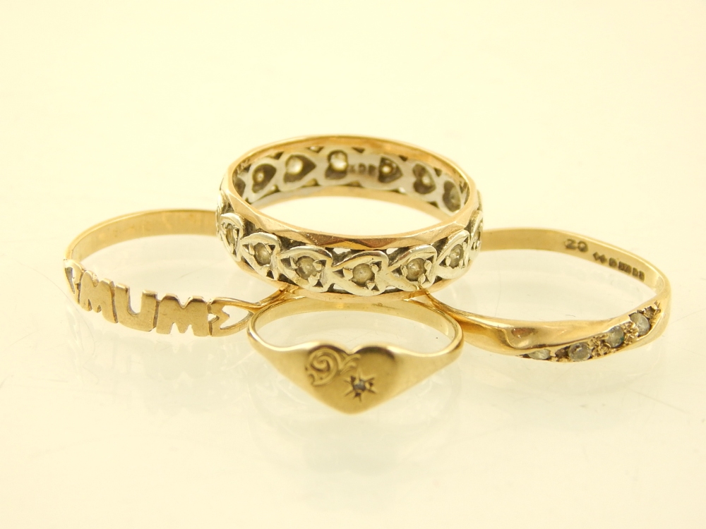 Four 9ct yellow gold rings, to include a four white stone, an eternity, a mum and a heart ring. - Image 2 of 3