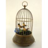 A Victorian style birdcage singing automaton. H.