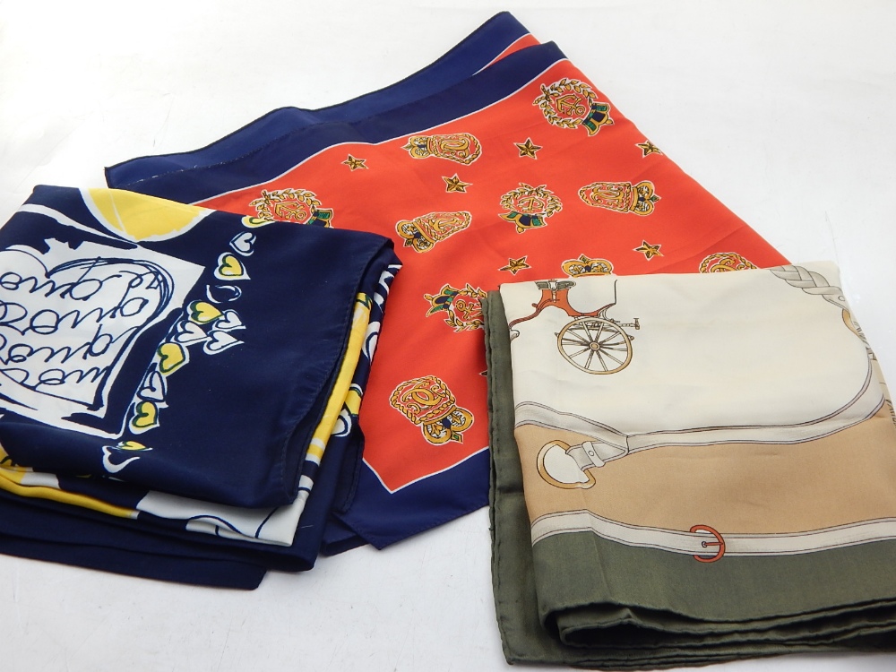 A Celine silk scarf, decorated with horse and carriages, together with two other silk scarfs. - Image 2 of 3
