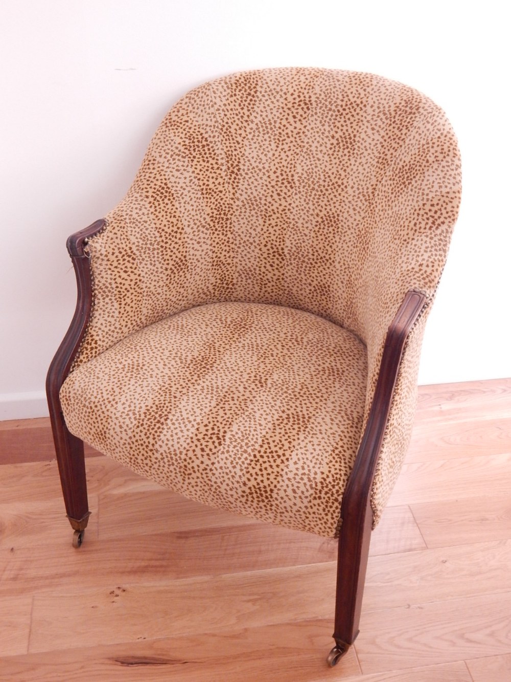 A 19th century mahogany framed tub chair, covered in a leopard skin style fabric, - Image 3 of 3