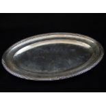 A late 19th century oval white metal tray, bearing the maker's mark for Eugene Lefebvre,