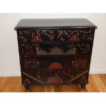 A Victorian pine five drawer chest, painted in the American style with flowers,