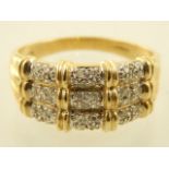 A gentleman's 9ct yellow gold and diamond ring.