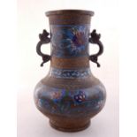 A Chinese cloisonne baluster vase, with cast dragon handles,