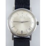 A Zenith automatic wristwatch, champagne dial, baton numerals, leather strap.