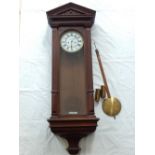 An early 20th century oak cased Vienna style regulator,