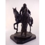 A patinated bronze of an Arab lady on horseback with male attendant,