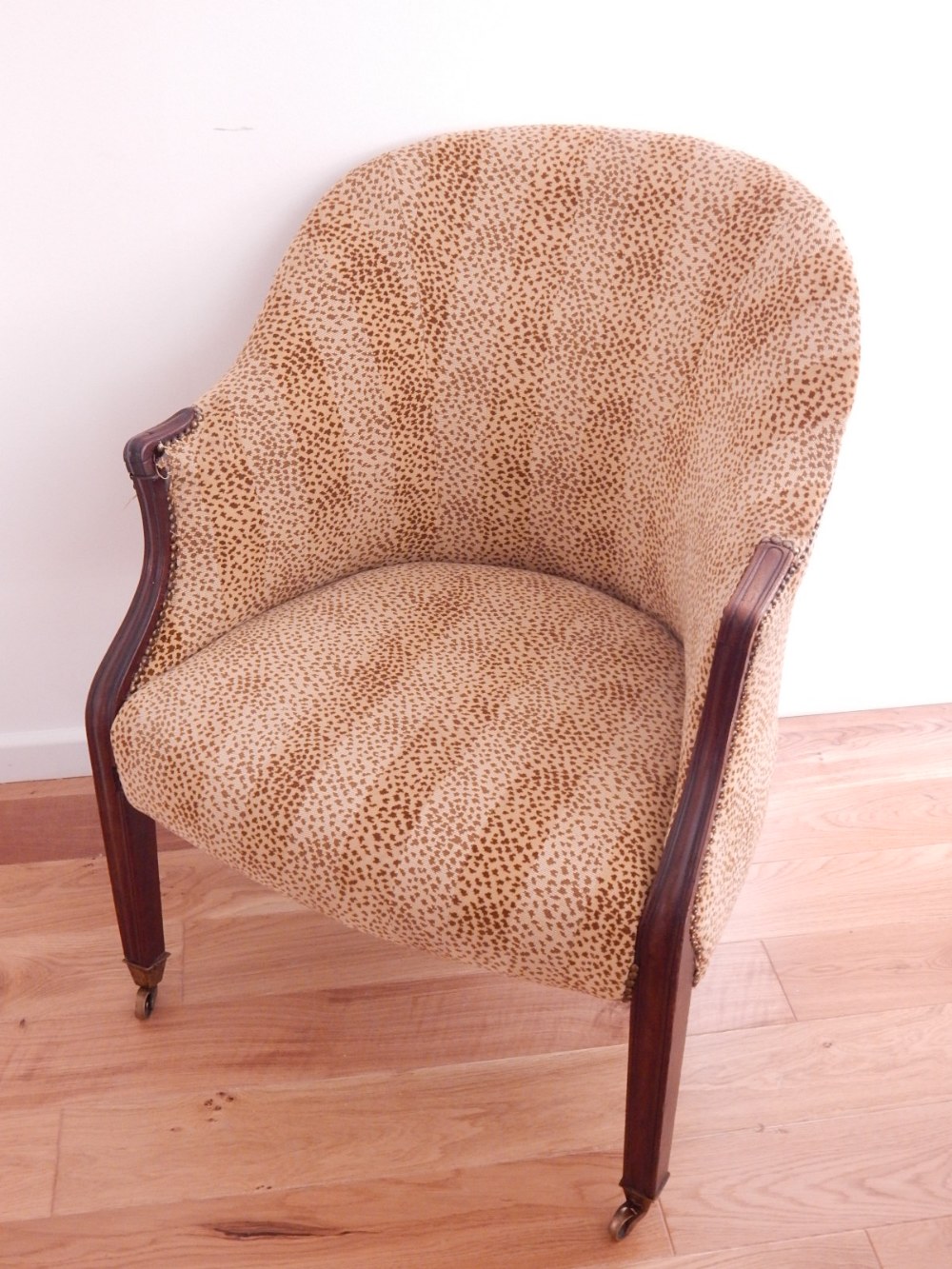 A 19th century mahogany framed tub chair, covered in a leopard skin style fabric, - Image 2 of 3