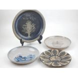 A quantity of stoneware side dishes, one with impressed yew tree, the others with floral decoration,