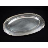 A Christofle oval silver plated tray, reeded and scalloped edged border. L.44cm.