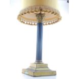 An early 20th century gilt metal, faux marble Corinthian column table lamp, H 46cm.