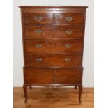 An early 20th century George III style mahogany chest on stand fitted two short and three